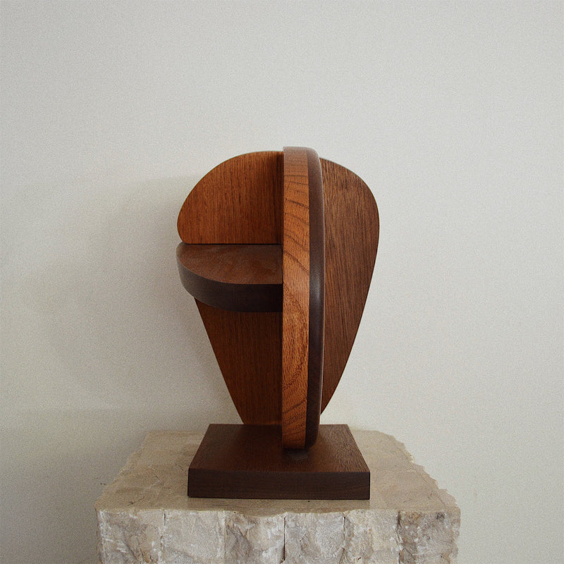 handcrafted oak, walnut, and ebony wood abstract face sculpture back view