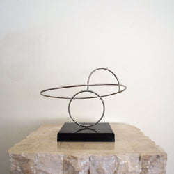 Aluminum kinetic sculpture by John W. Anderson