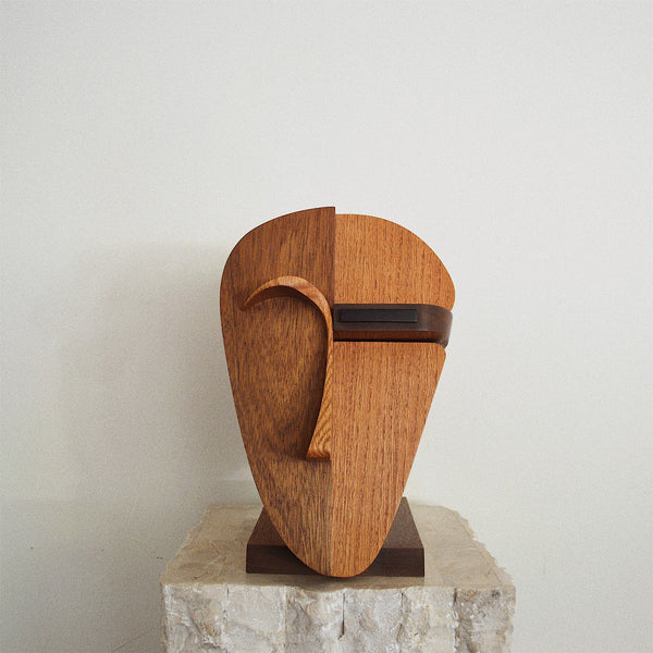 handcrafted oak, walnut, and ebony wood abstract face sculpture