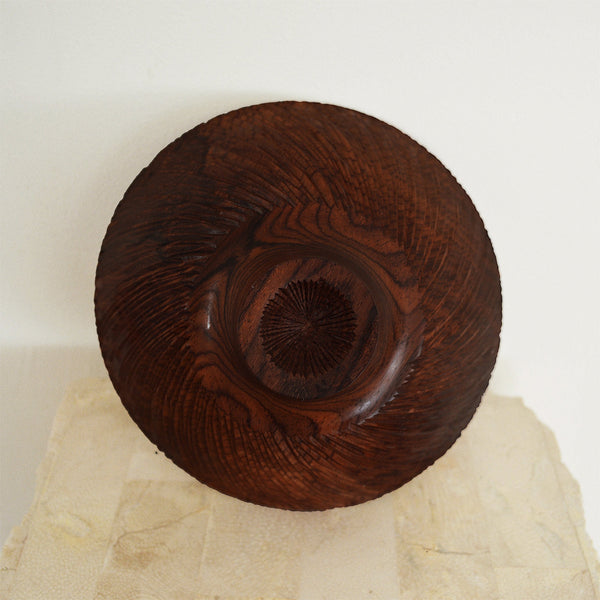 Bottom view of textured hand carved cocobolo wood bowl by Al Stirt