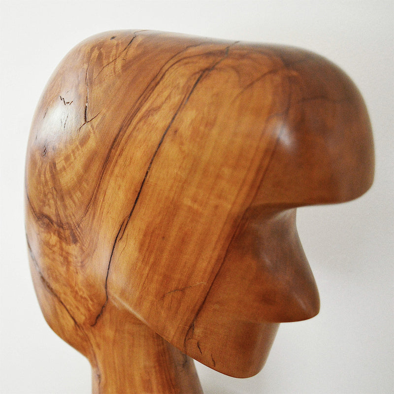 studio craft hand carved olive wood modernist sculpture close up view of wood grain