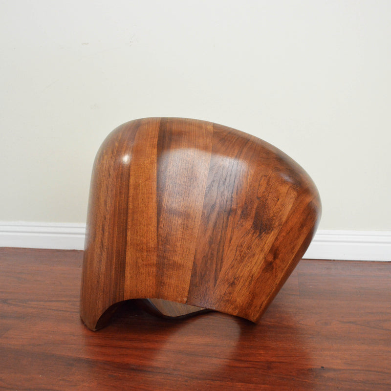 Sculptural walnut wood low chair by Norman Ridenour