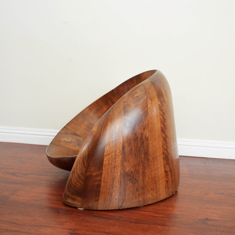 Sculptural walnut wood low chair by Norman Ridenour